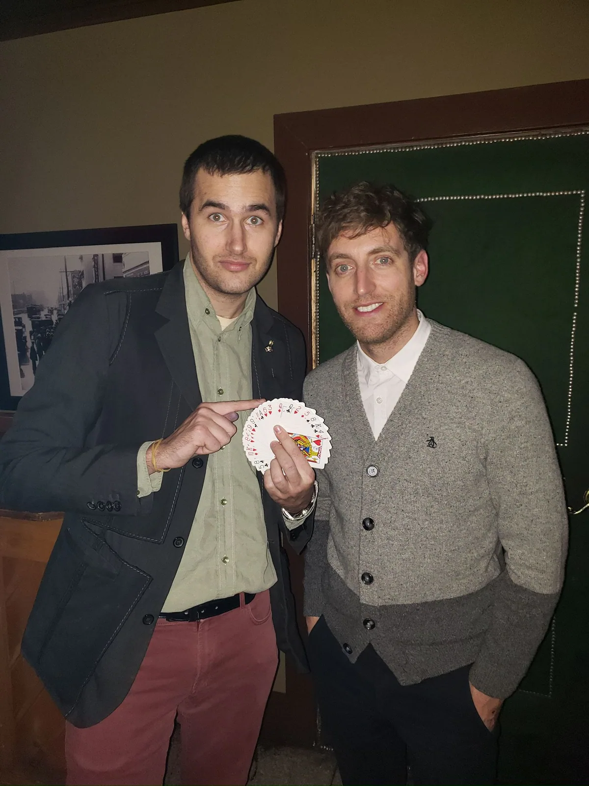 Roby Sobieski performing close-up magic for Thomas Middleditch